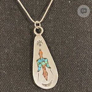 Southwestern Sterling Crushed Turqoise and Coral
Thunderbird Pendant Necklace